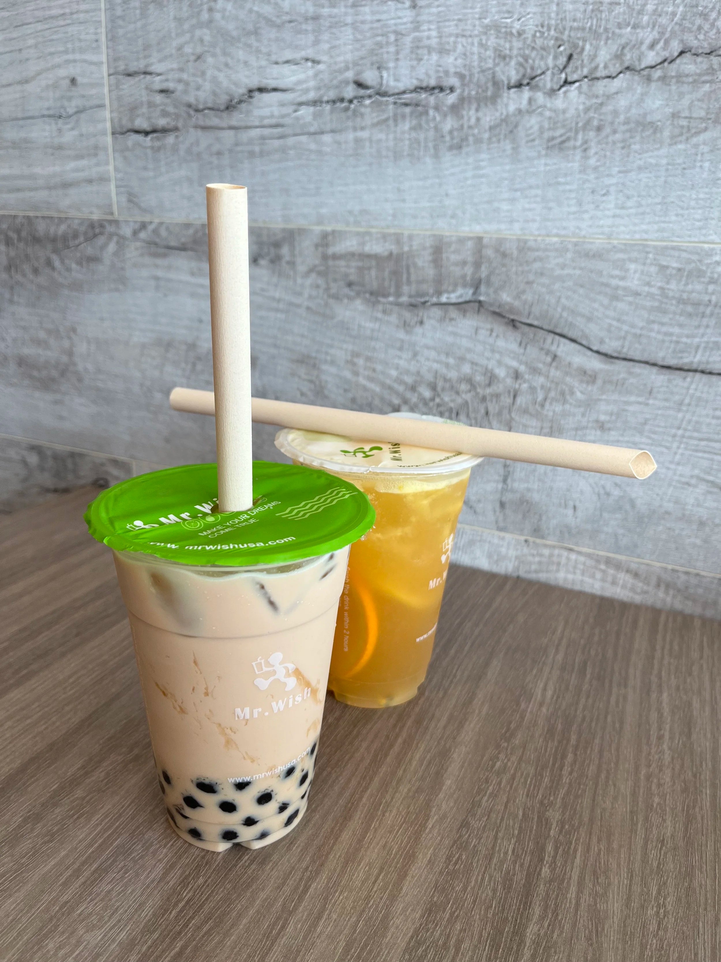 Compostable straws served in colorful drinks